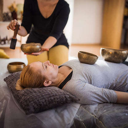 Tibetan brass singing bowl with Sanskrit – handmade meditation instrument for stress relief.