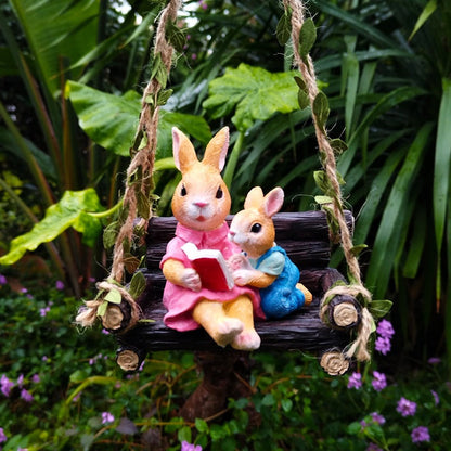 Simulated rabbit reading animal ornament