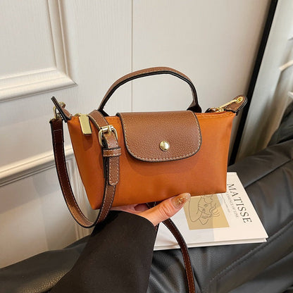 2025 Women's Mini Dumpling Handbag. Made of high - end nylon. Stylish shoulder/crossbody phone bag.