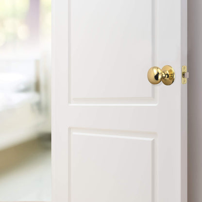 Design House Cambridge 2-Way Latch Passage Door Knob Polished Brass