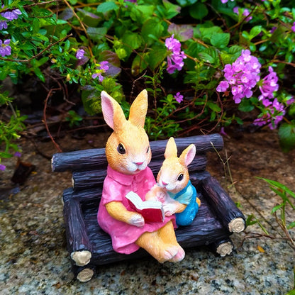 Simulated rabbit reading animal ornament