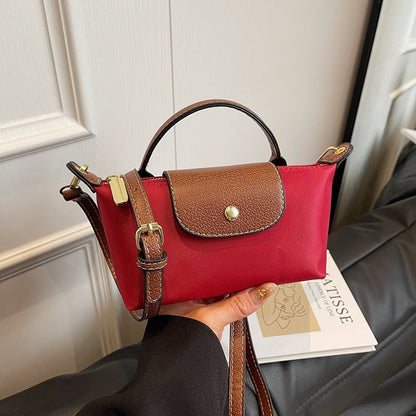 2025 Women's Mini Dumpling Handbag. Made of high - end nylon. Stylish shoulder/crossbody phone bag.
