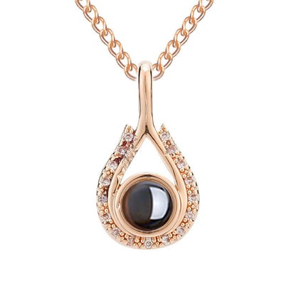 Waterdrop shaped fashion projection necklace with 100 languages. I love you. Color photos, customized lover accessories