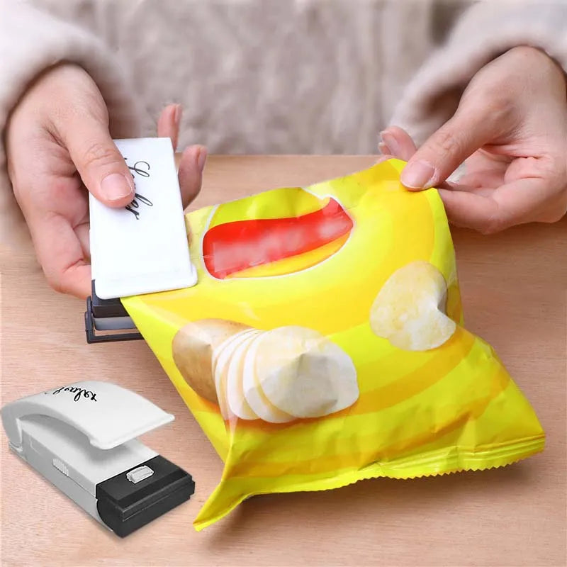 Mini sealing machine small household plastic sealing machine snack moisture-proof sealing machine