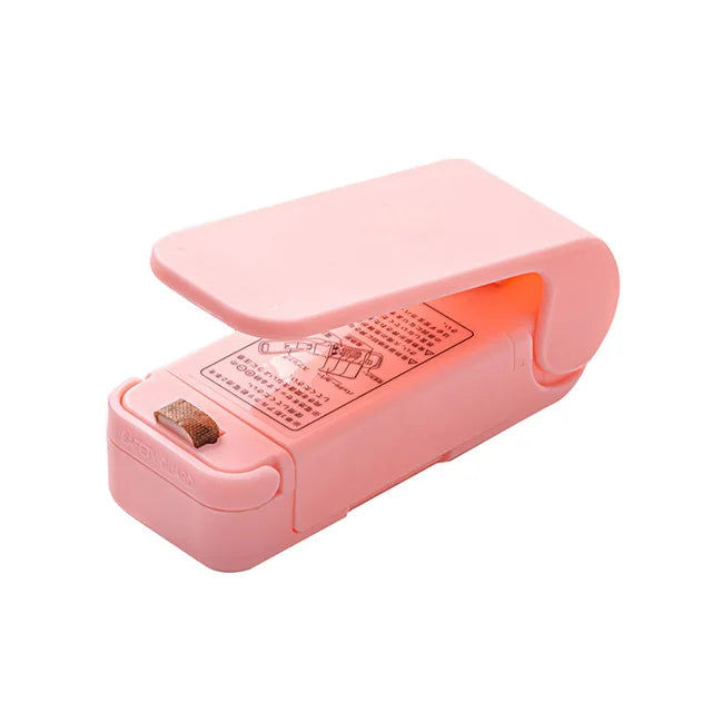 Mini sealing machine small household plastic sealing machine snack moisture-proof sealing machine