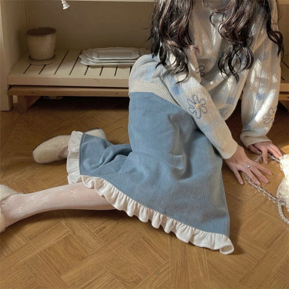 A Woman Wearing A Sweater With A Base Top
